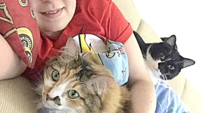 Michele Oliveira e seus xodós Dóris e Miles