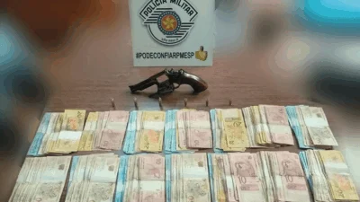 Comerciante é preso com revólver calibre .38 e R$ 14 mil em dinheiro
