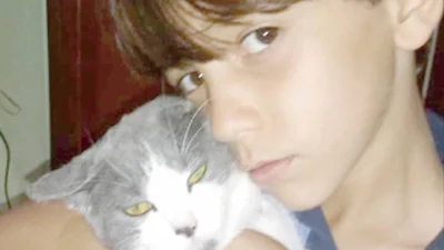 Conheça Rafa e sua gatinha Helena