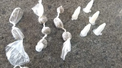 GM encontra entorpecentes em calçada