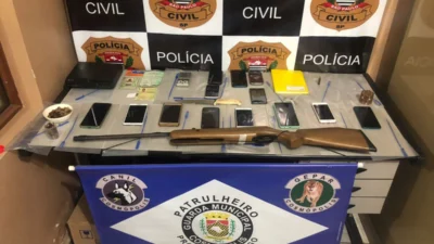 Celulares, arma, munição e maconha são encontrados durante cumprimento de mandado