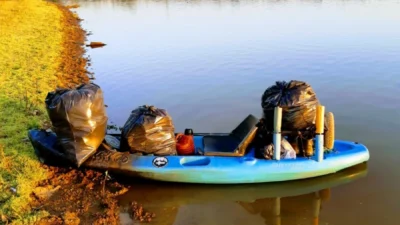 Grupo “Guardiões da Represa” retira lixo e planta árvores na margem do rio